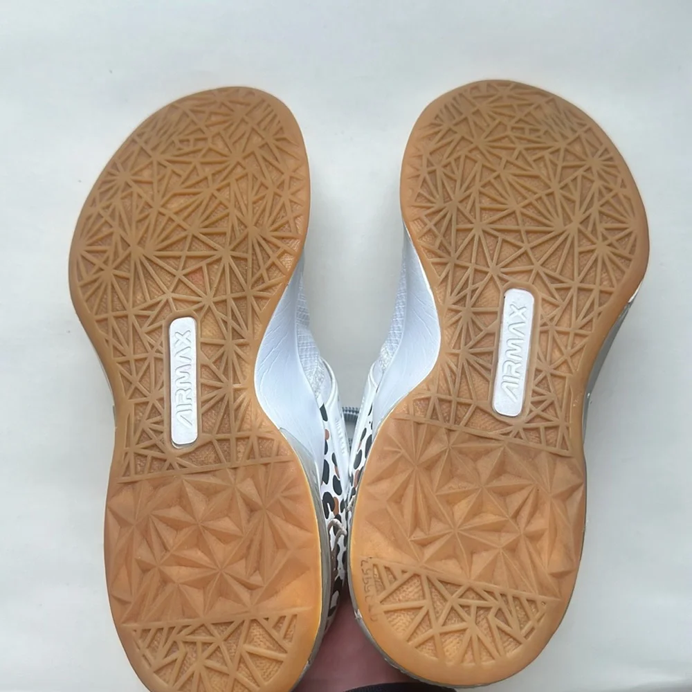 White Nike air max shoes, size 5 with gold Nike embroidering/cheetah print heal